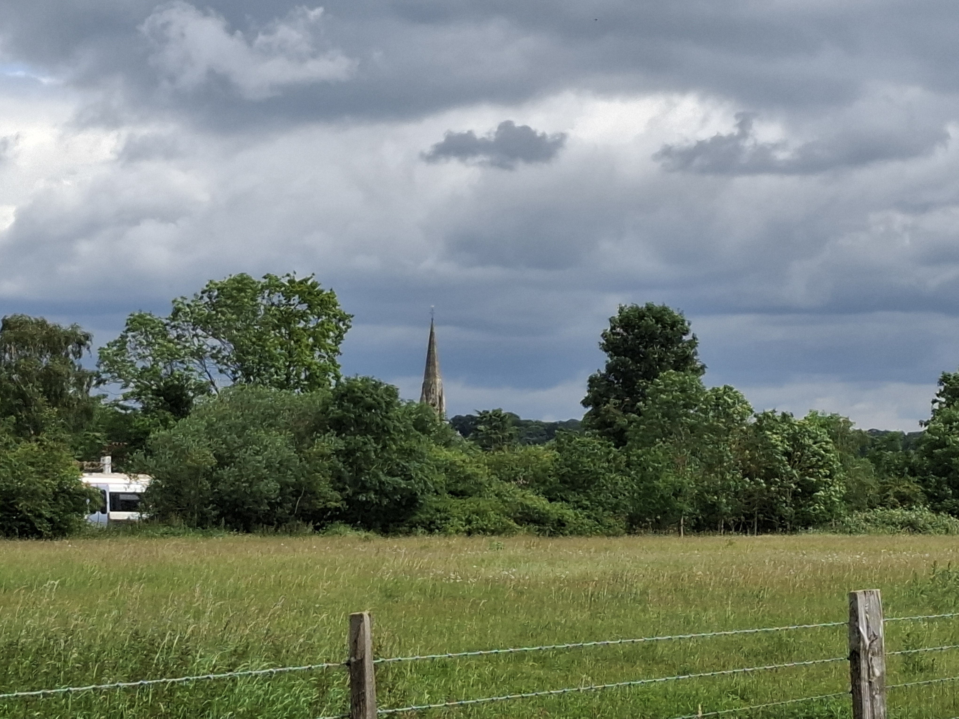 The Spire of St John's, pictured from College Farm.